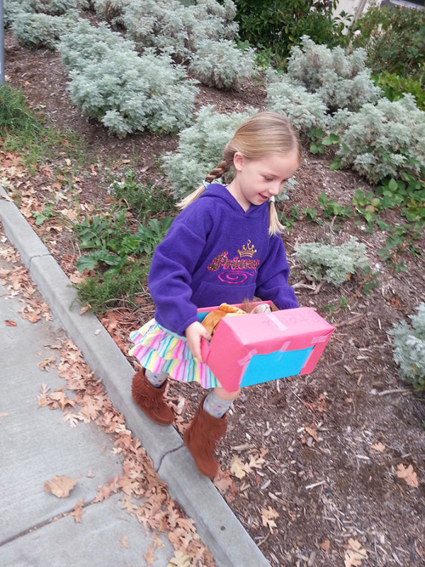 Carrying her first diorama to school